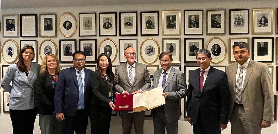 Bangladesh foreign minister participating in Hague Apostille Convention accession ceremony related to international document authentication and apostille recognition